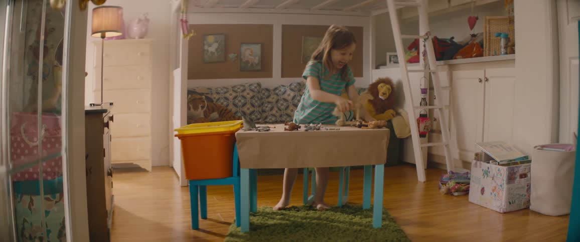 A view of a child playing with a toy