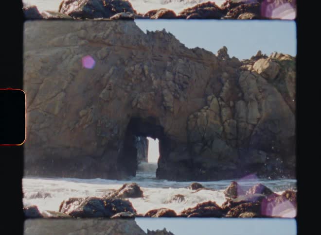 A view of waves crashing on the beach Big Sur California Super 8 4k Film Scan