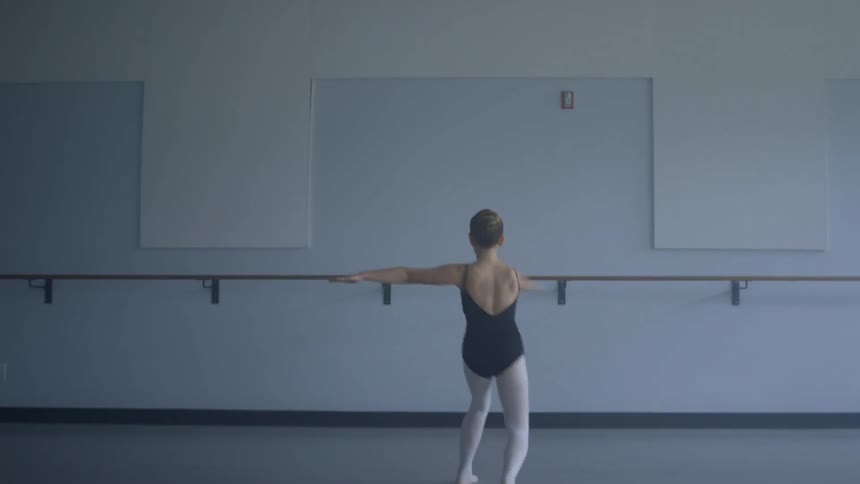 Ballet dancer practicing her dancing and spinning
