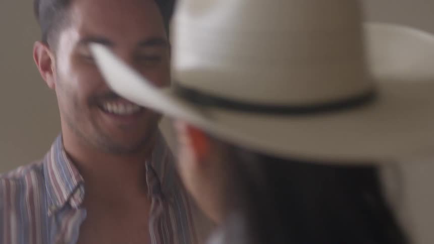 A man and woman are dancing