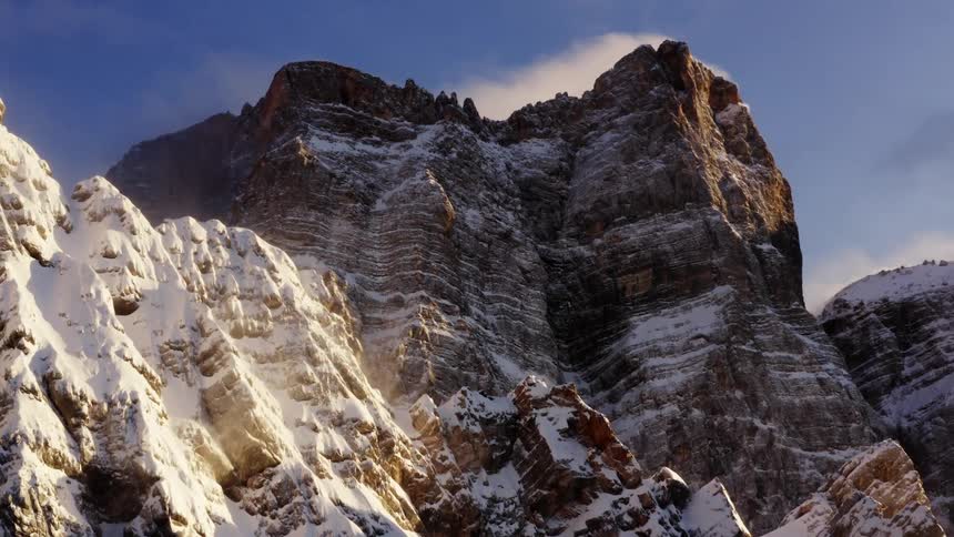 View of snowy high cliff