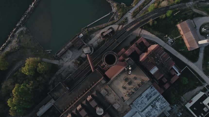 A large chimney is in the factory