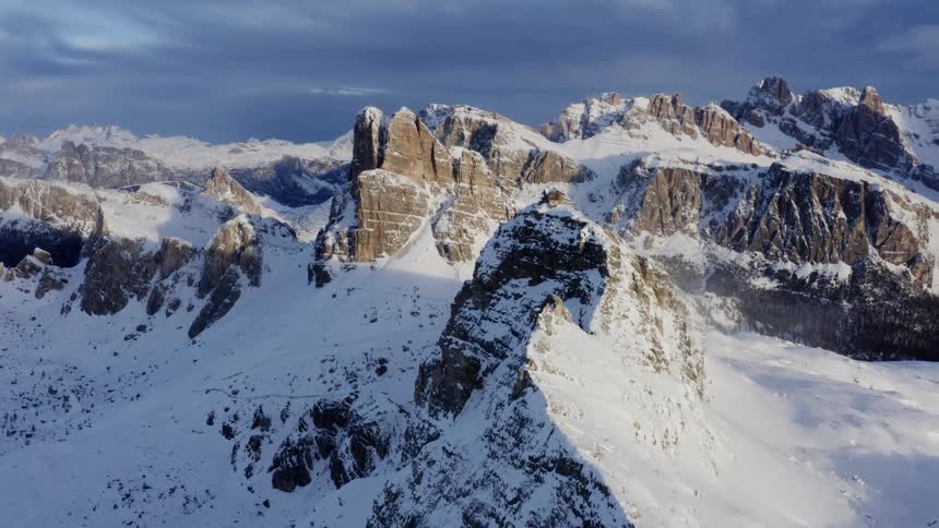 The mountains are covered in thick snow