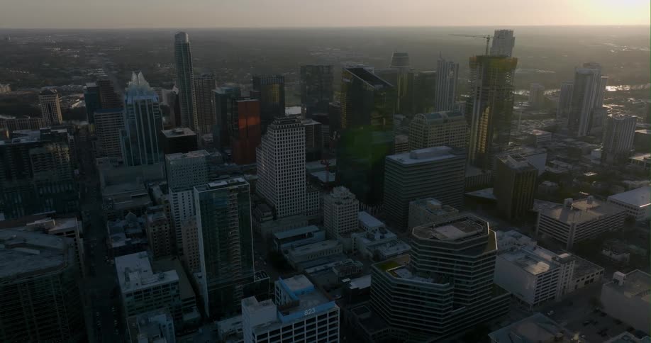 The sun is rising on the city