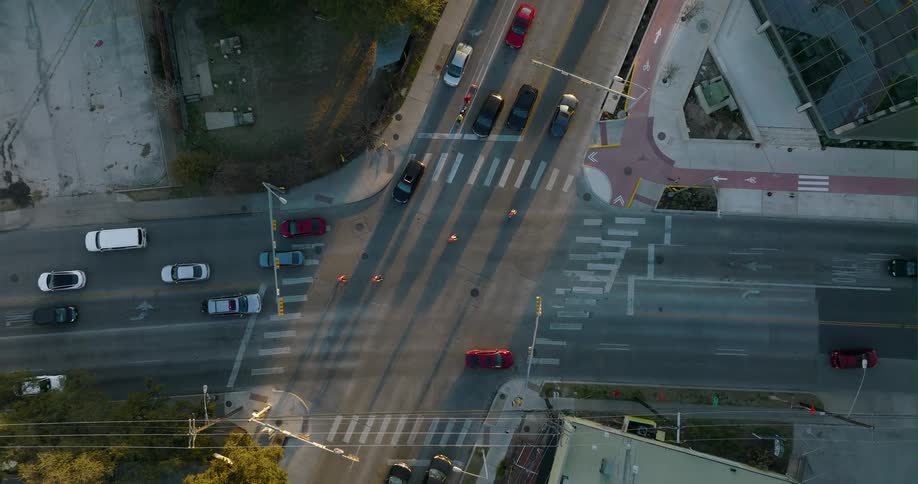 Cars traveling through an intersection in a city