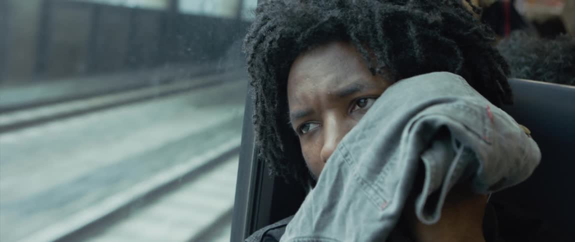 A man is a passenger in a public transportation