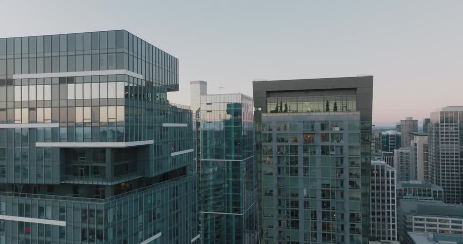 Pullback descent between tall and modern downtown apartment and office towers