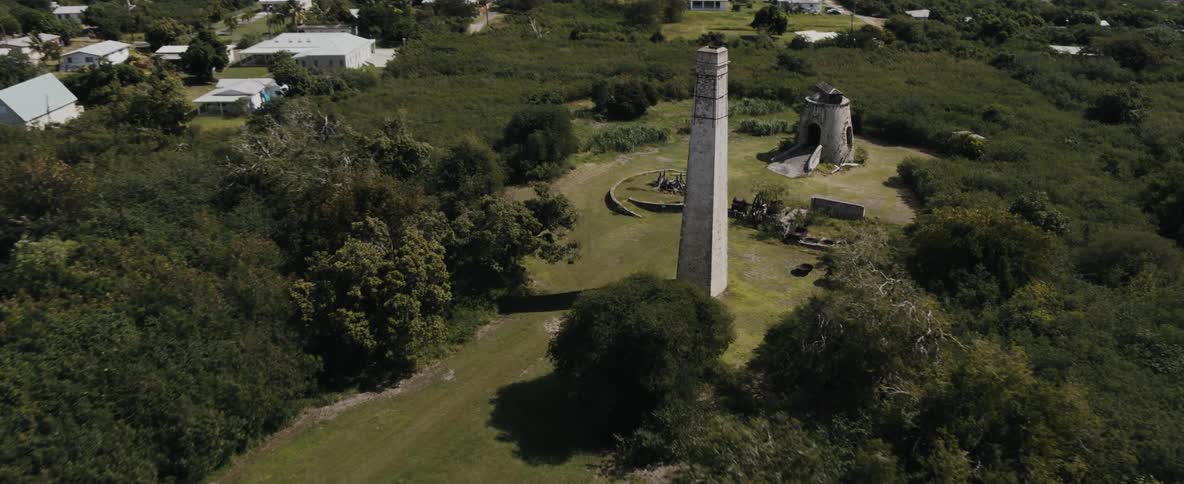 An aerial view of a landmark in a field