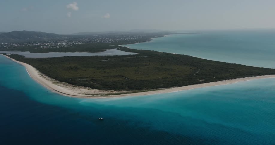 An aerial view of a beach in the ocean