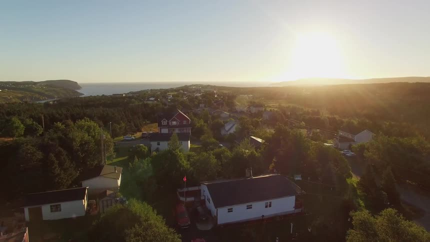 Drone Sunrise over coastal town in Newfoundland