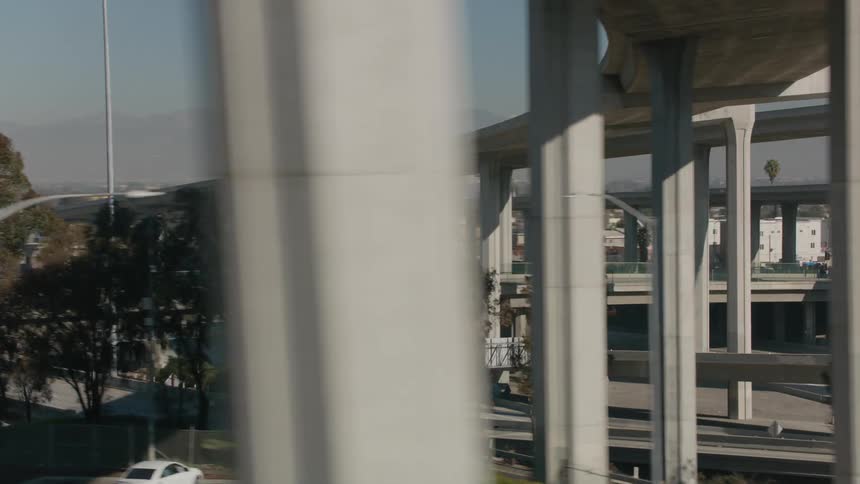 An aerial view of a highway in a city