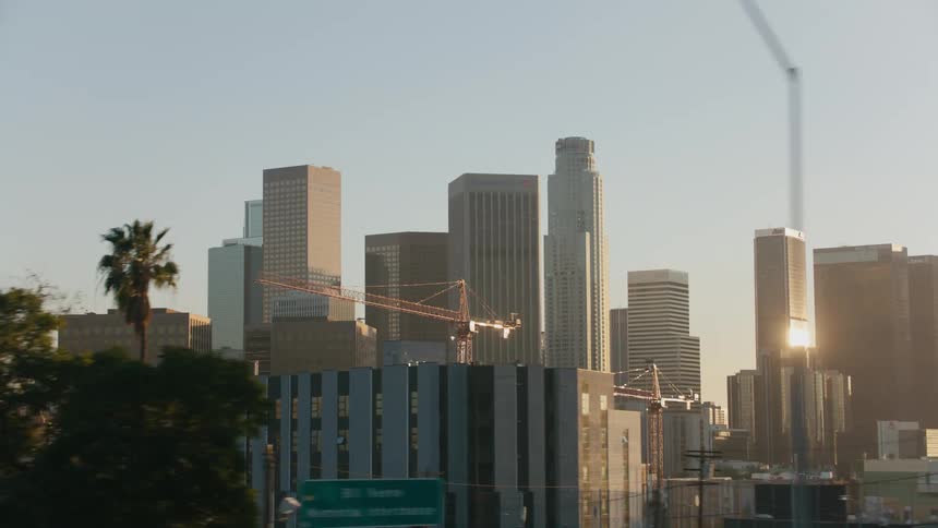 Tall skyscrapers in the distance on a sunny day