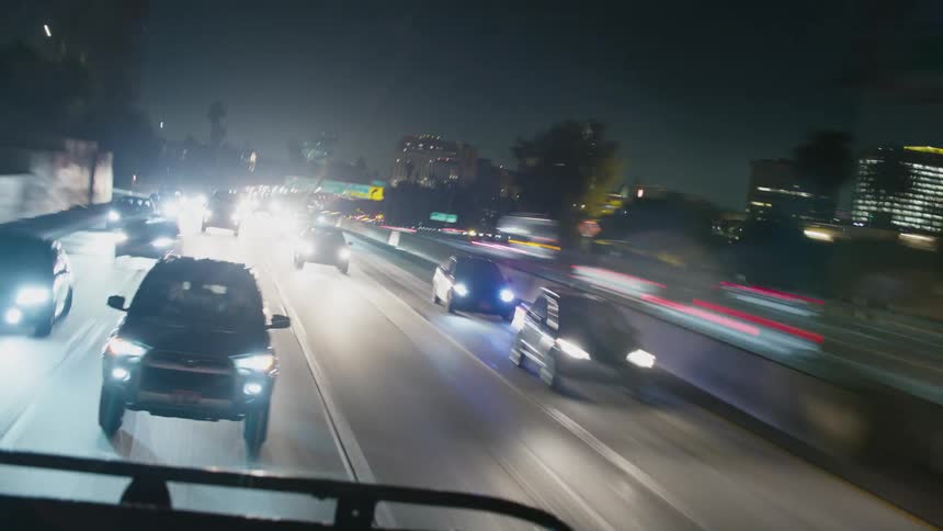 Timelapse of cars driving at night