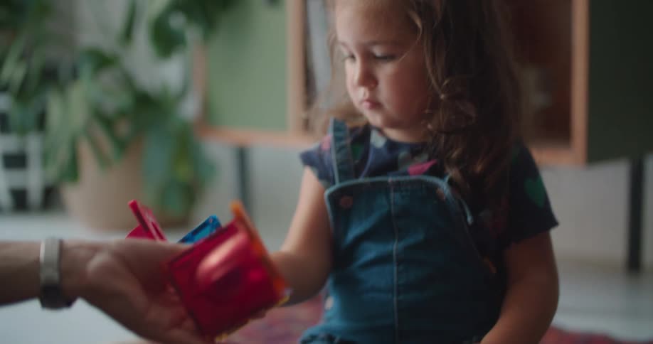 The child is playing with toys