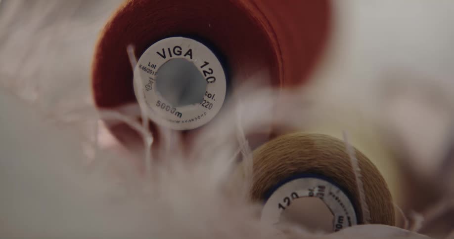 A pile of spools of thread