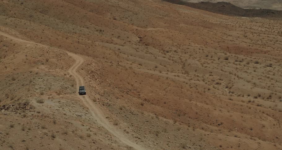 An aerial view of a vehicle driving off road