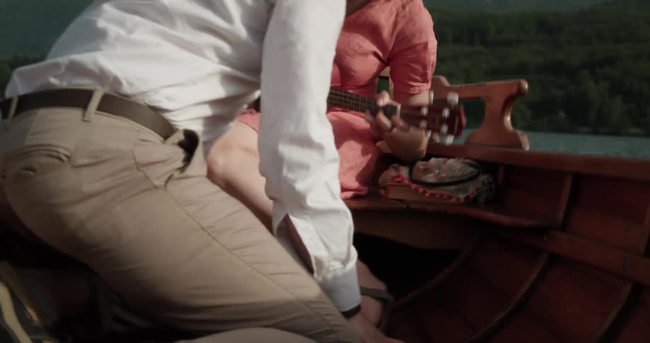 A couple kiss on the boat