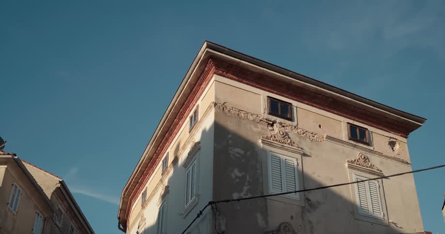 Close up view of a building in a city is displayed