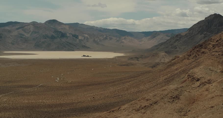 An arid mountain valley during the day
