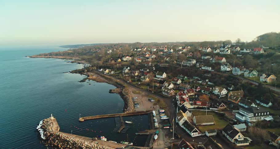 An aerial view of a coastal community in the morning