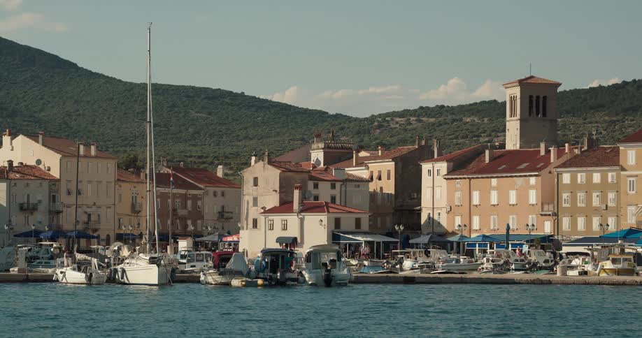 A marina on the coast of town on a clear day