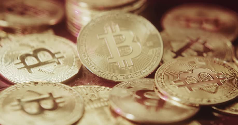 Gold coins scattered on a table