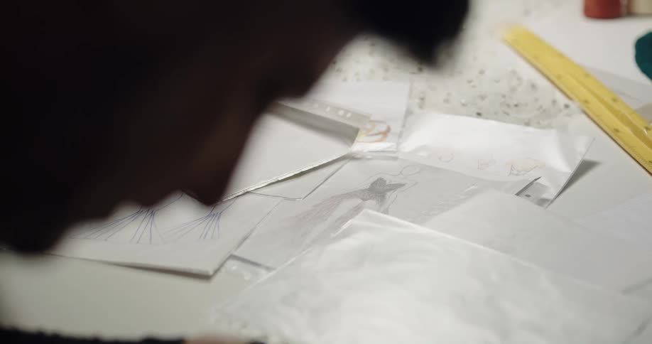 A man is working at his desk