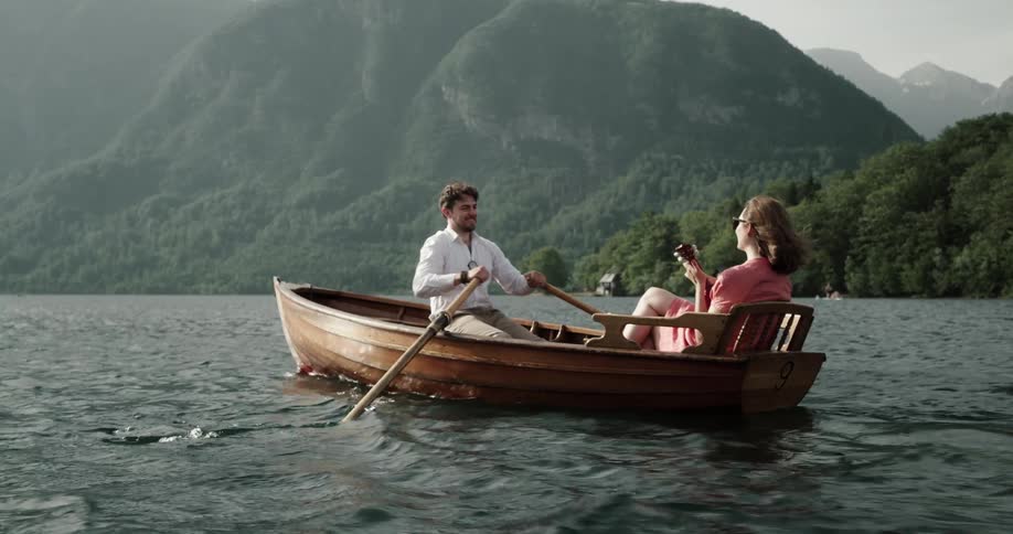 A man and woman in a rowboat together