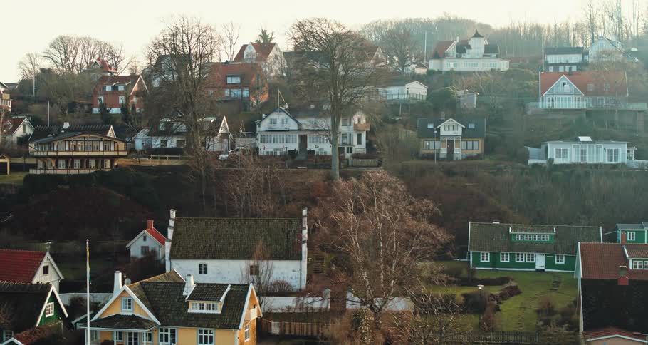 A small town residential area on a hillside during the day