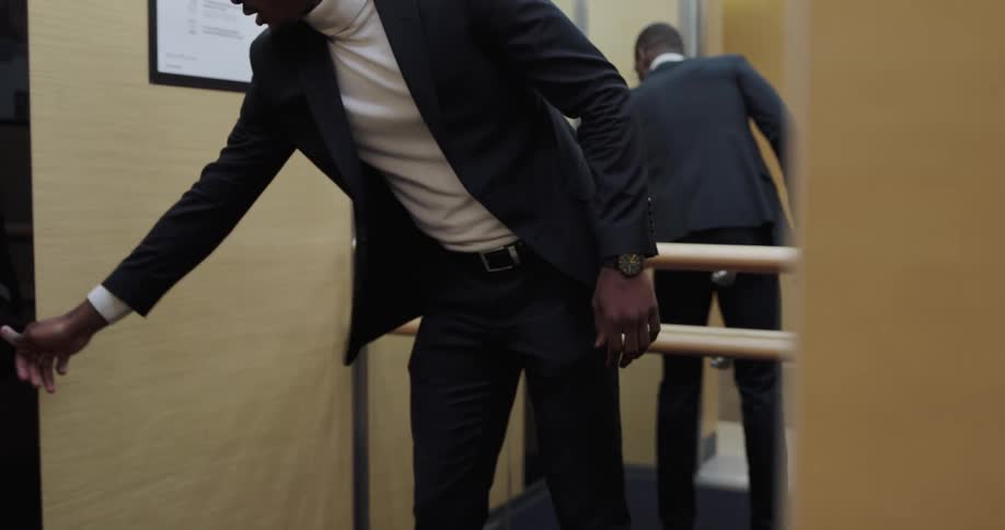 A man gets on the elevator