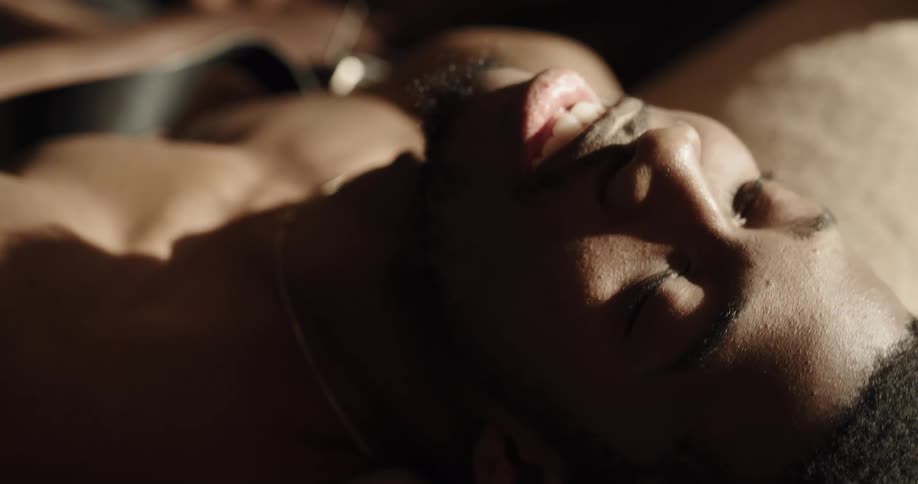A man laying in a room