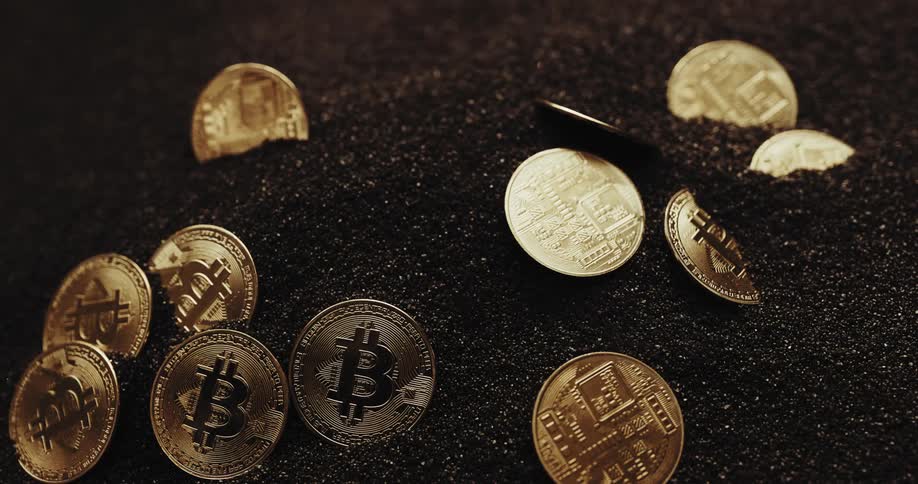 Shiny black power is moving around gold bitcoins