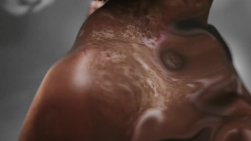 A brownish blob pulsing and undulating