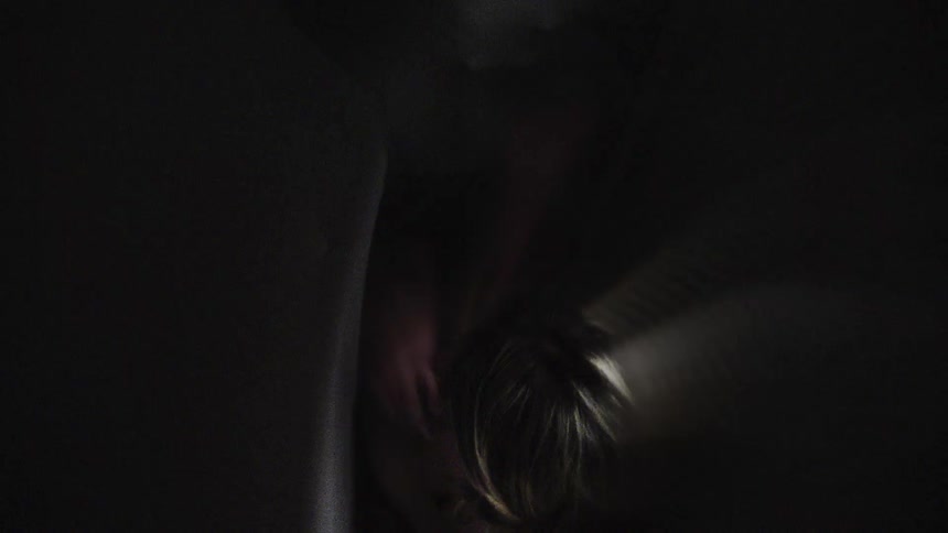 A person walking into a tight room
