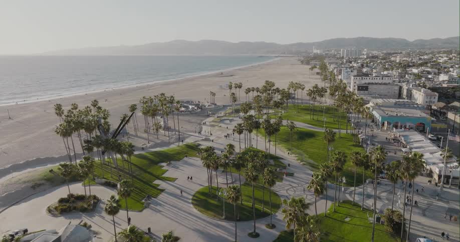 A public park on a beach in a city during the day