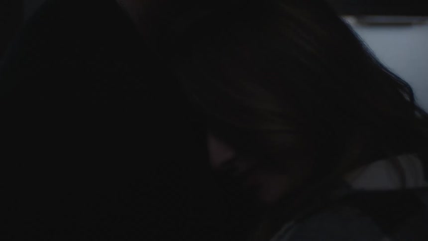 Couple romantically dancing with the woman lying her head on her boyfriends chest