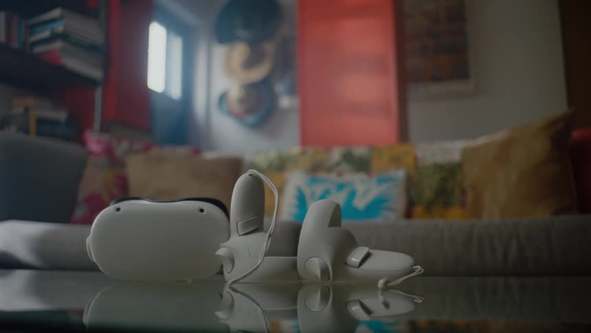 A gaming system is set on a table indoors