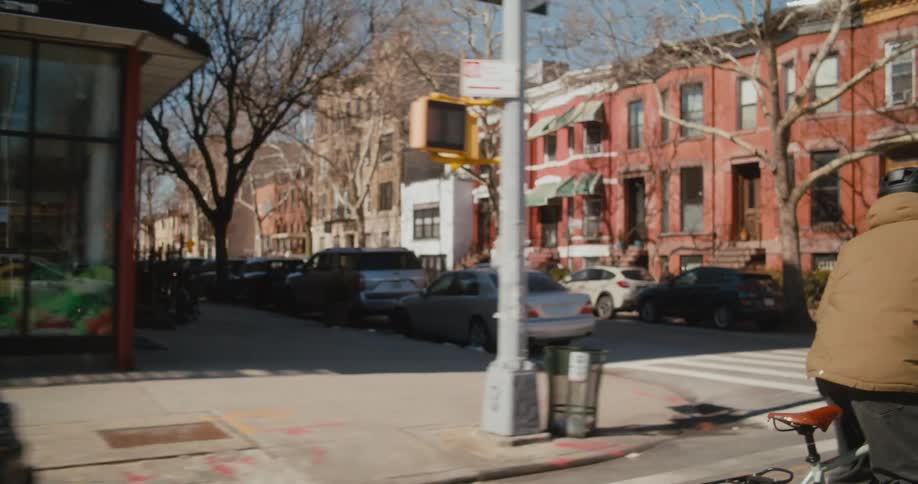 A man rides his bike through the city