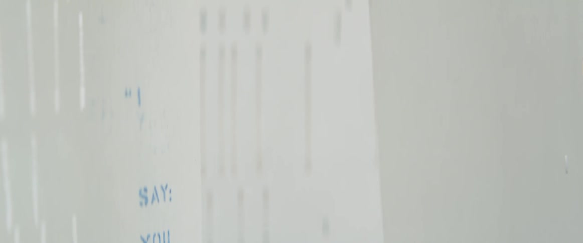 Words printed on long strips of paper