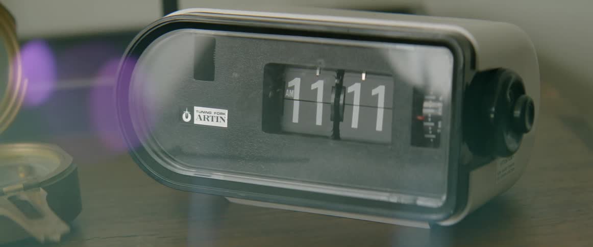 A clock reads eleven eleven