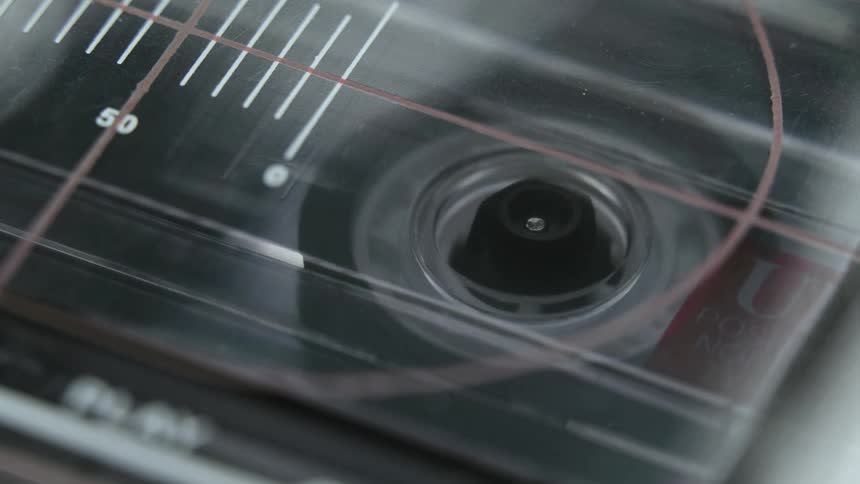 Close up of casette tape playing