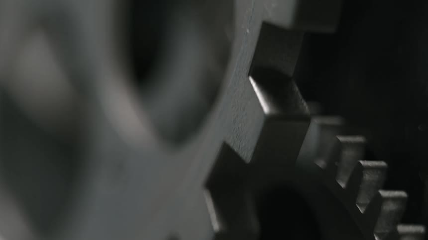 The gears slowly turn