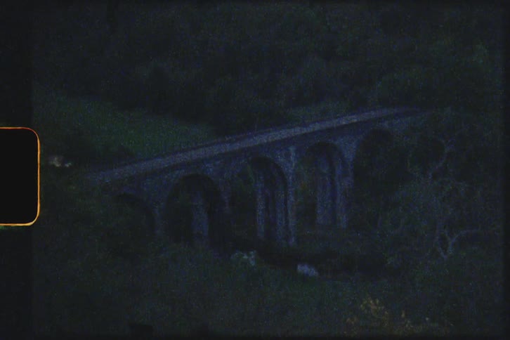 Bridge with arches sits over the valley