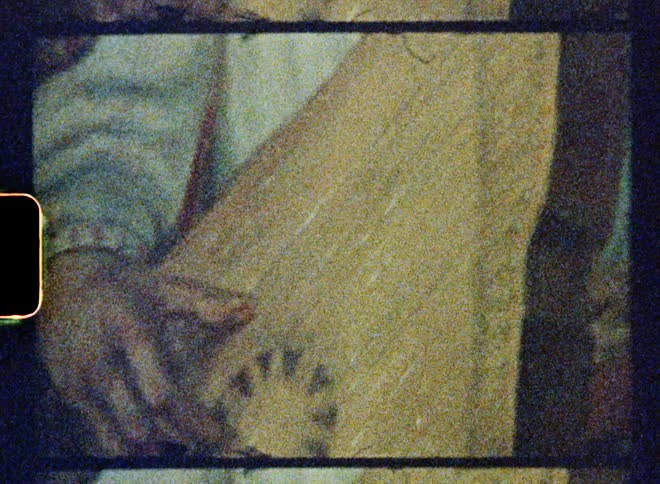 A view of a painting of a child playing an instrument