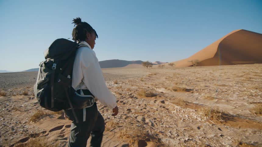 A woman hiking in the desert