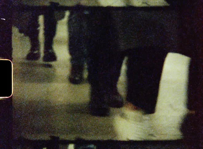 Pedestrians travel through the hall