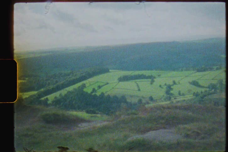 The fields are green on a cloudy day