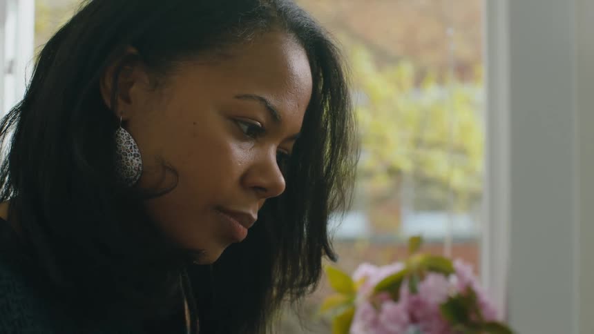 A black woman working at home
