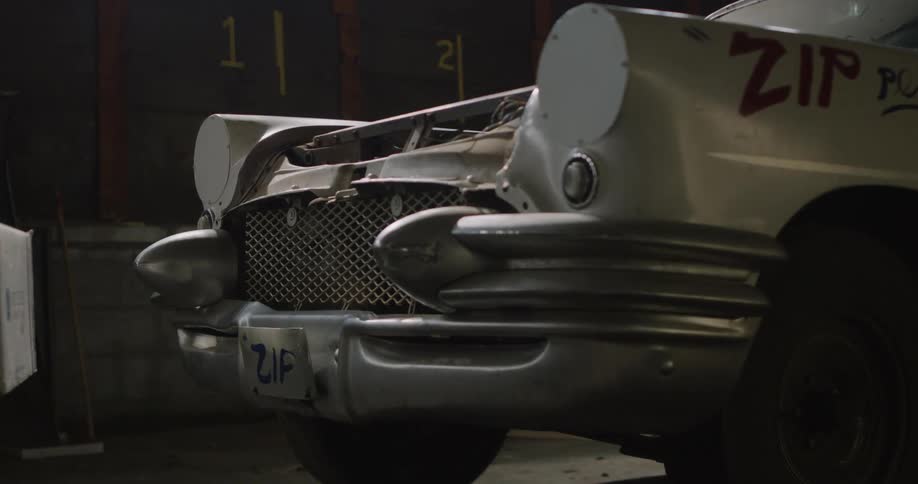 The car is parked in the garage