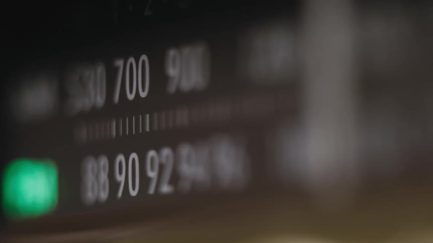 A green light glows on a display of two rows of numbers